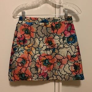 Like new Topshop floral and glitter mini skirt
